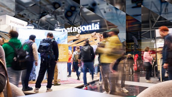 Visitors to ISPO Munich bustle around the packed halls