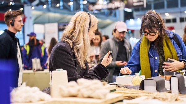 Two women look at various sustainable and innovative materials in the Material Lab at the Sustainability Hub